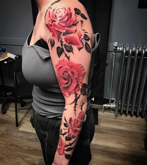 rose arm tattoo female.